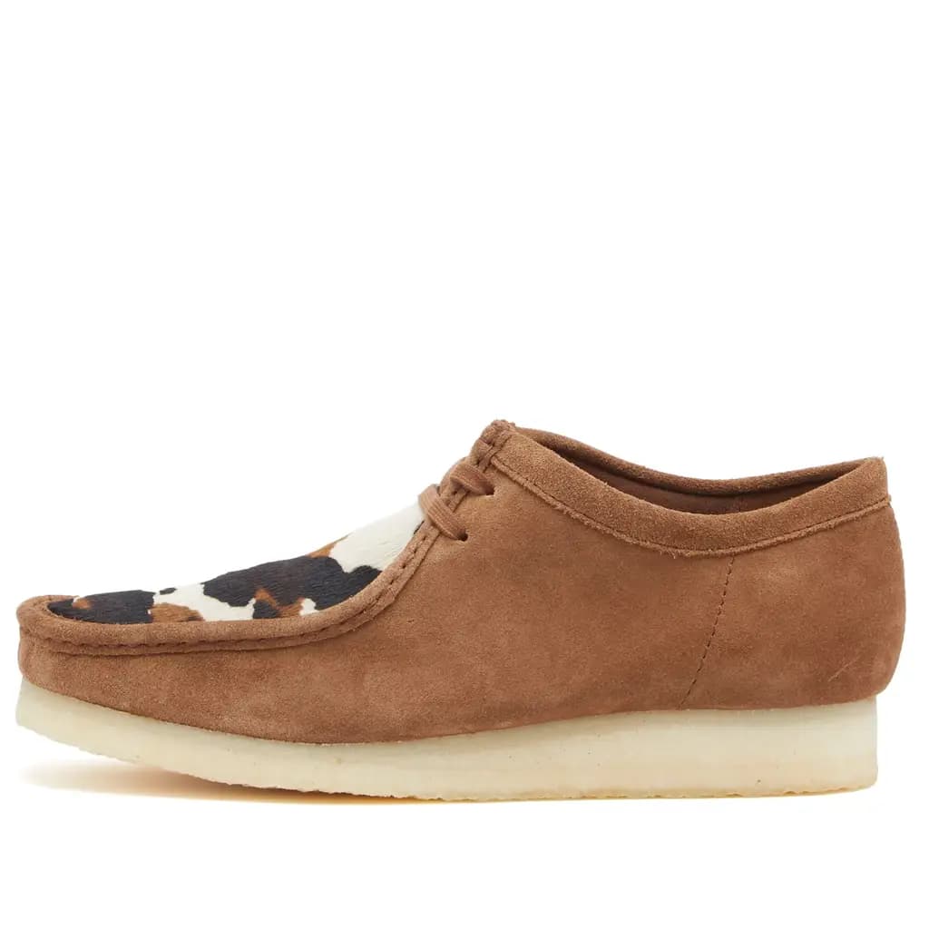 CLARKS WALLABEE COW - COLA INTEREST